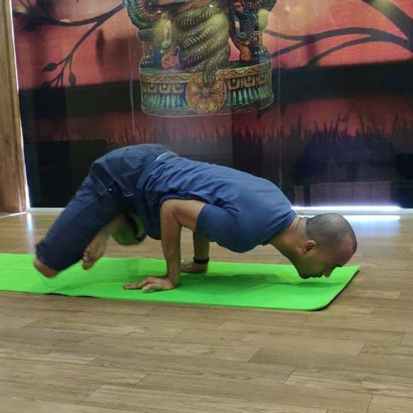 image of client doing yoga