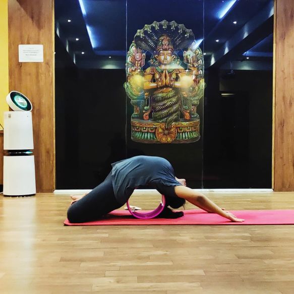 image of client doing yoga