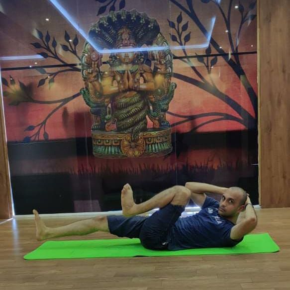 image of client doing yoga