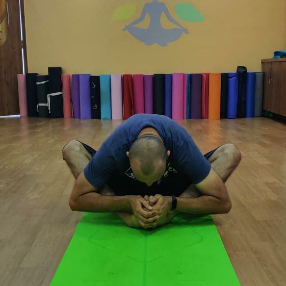 image of client doing yoga