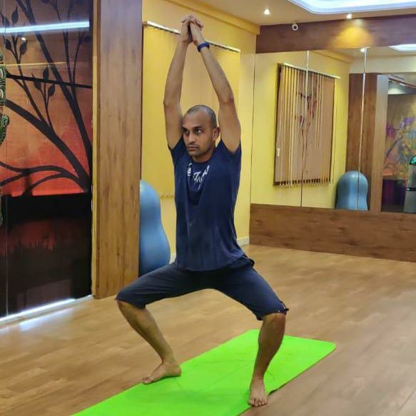 image of client doing yoga