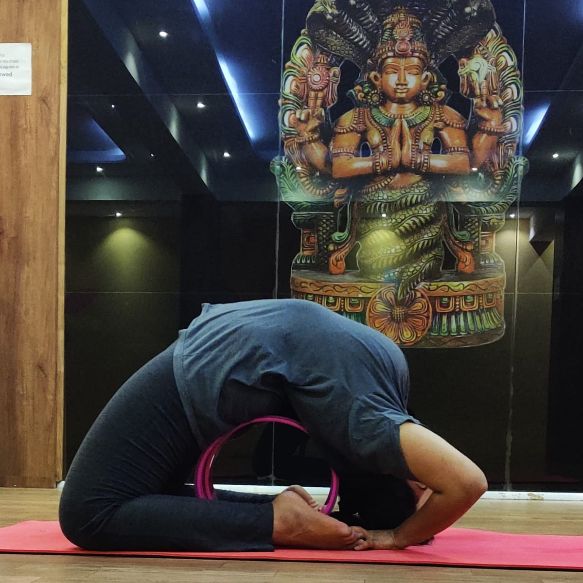 image of client doing yoga