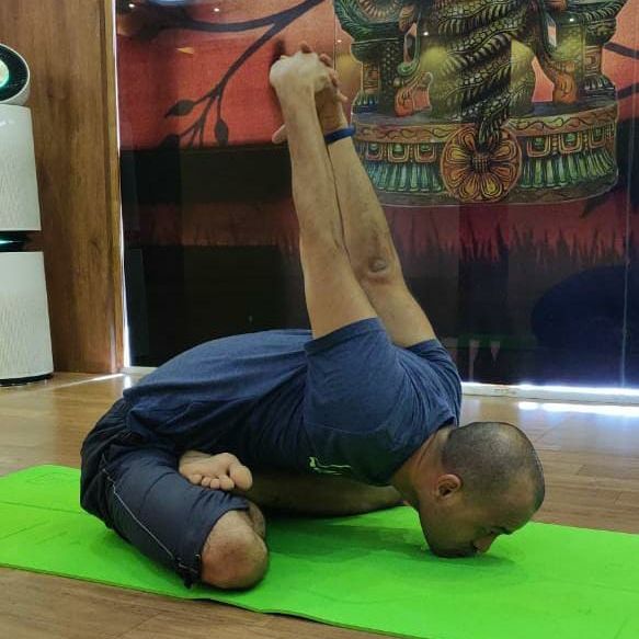 image of client doing yoga