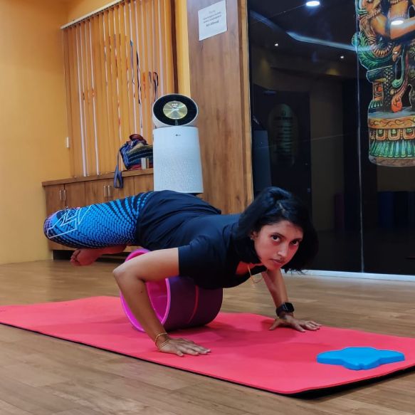 image of client doing yoga