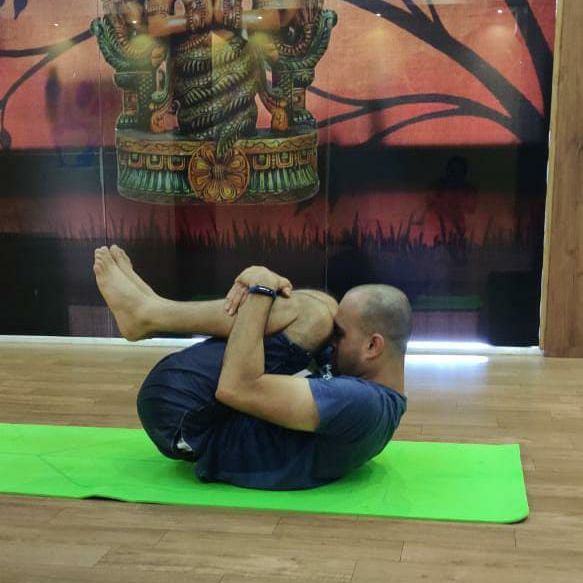 image of client doing yoga