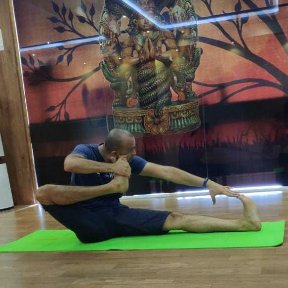 image of client doing yoga