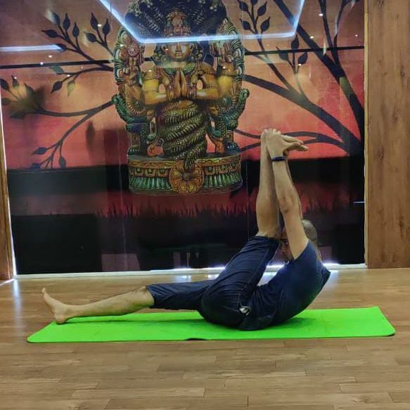 image of client doing yoga