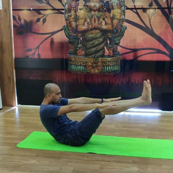 image of client doing yoga