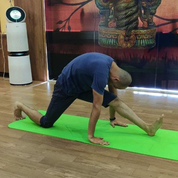 image of client doing yoga