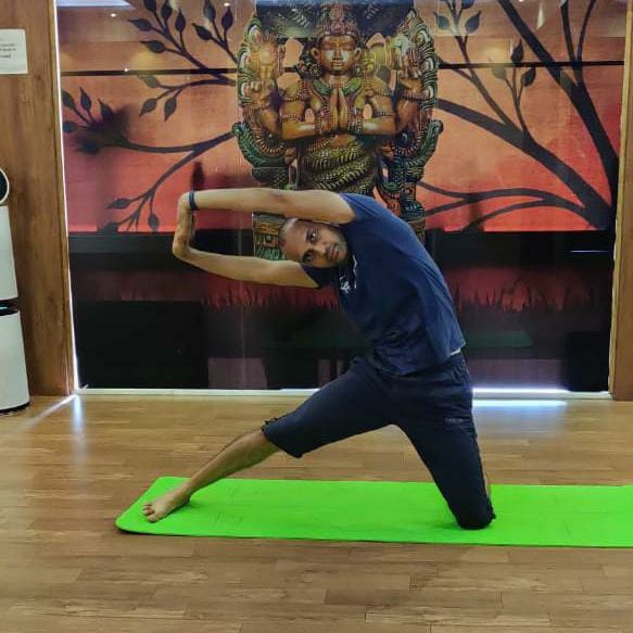 image of client doing yoga